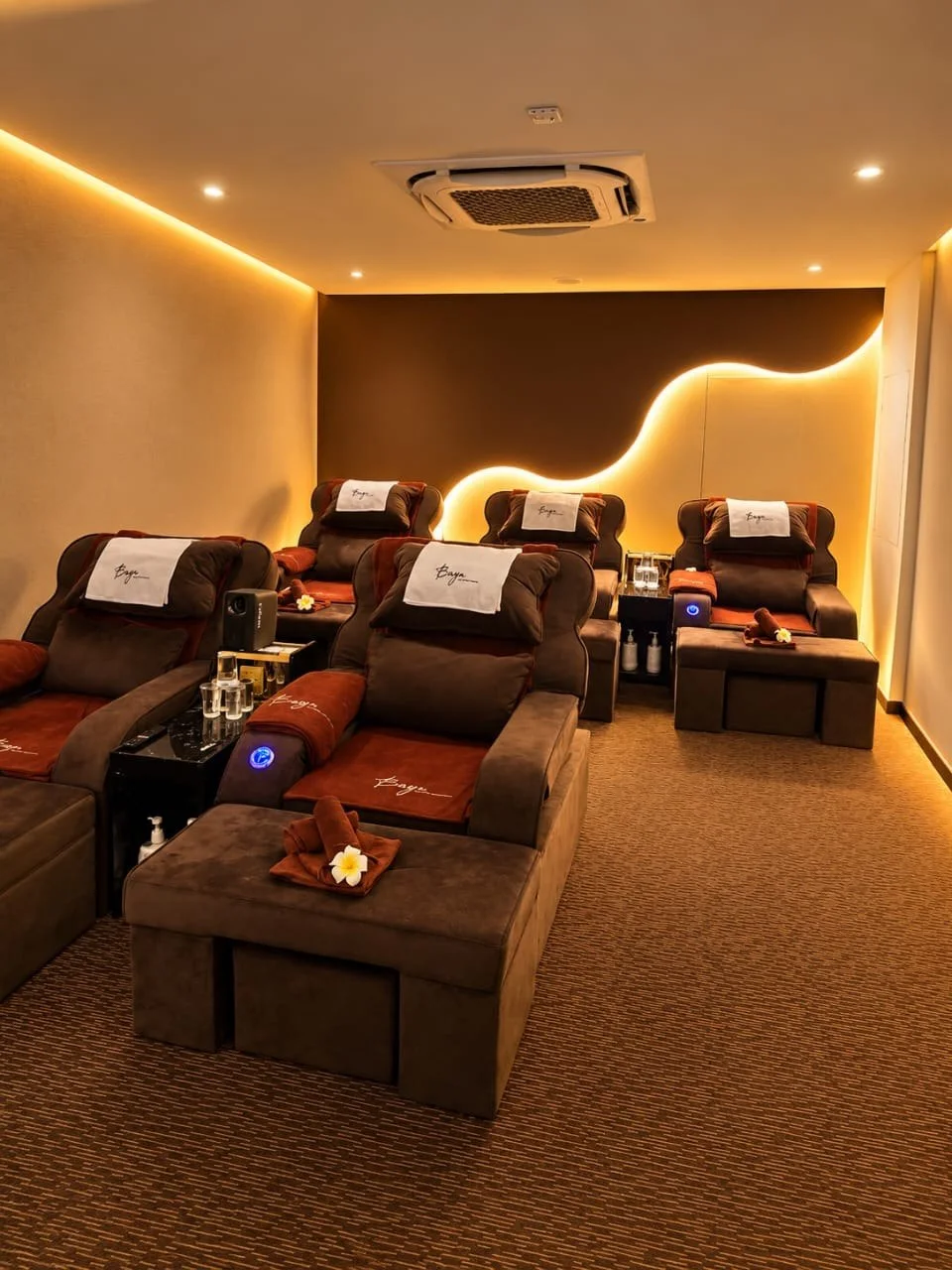 Comfortable reclining chairs in the reflexology lounge
