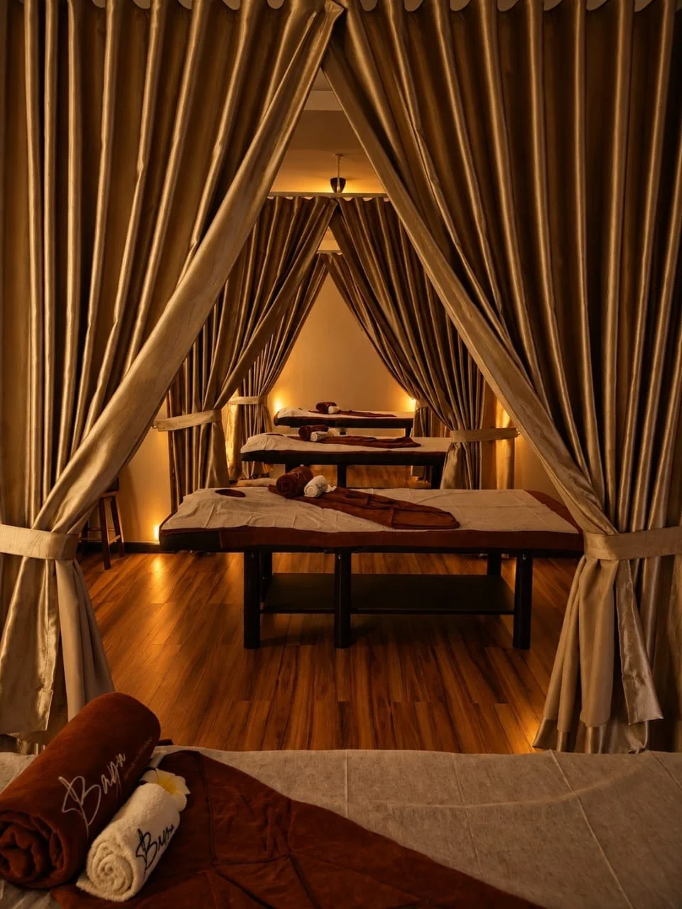 Curtained massage spaces
